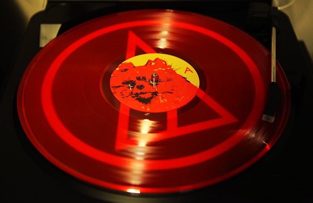 Logan Lynn's ADIEU on 150 gram red double vinyl album (2017 Disarm Magazine)